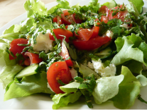 Classic tomato salad with feta cheese and garlic